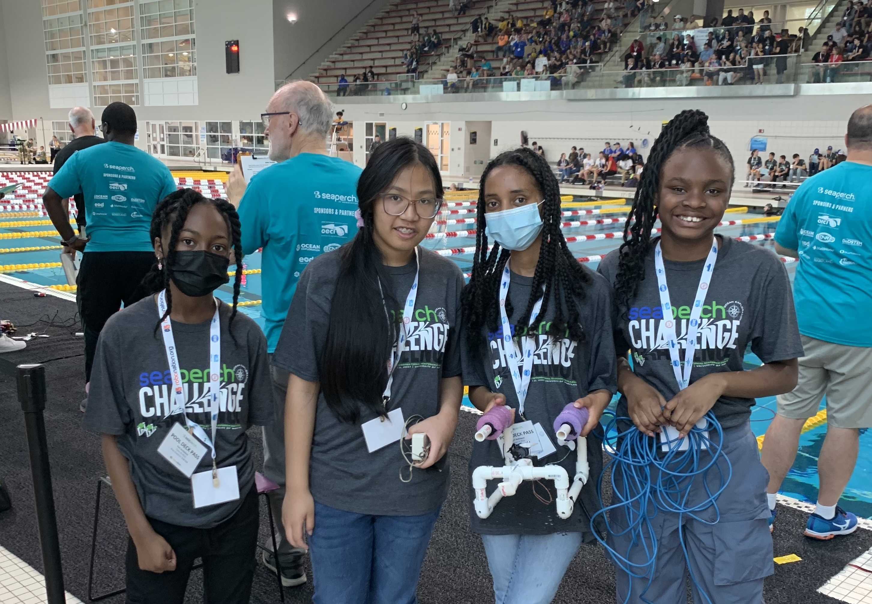 Students pose with their ROV at the 2023 International SeaPerch Challenge